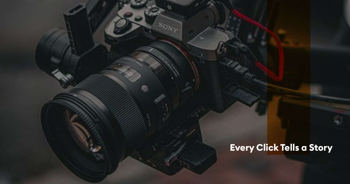 A professional cinema camera with a large lens mounted on a stabilizing rig, used for capturing high-quality video footage during a production shoot.