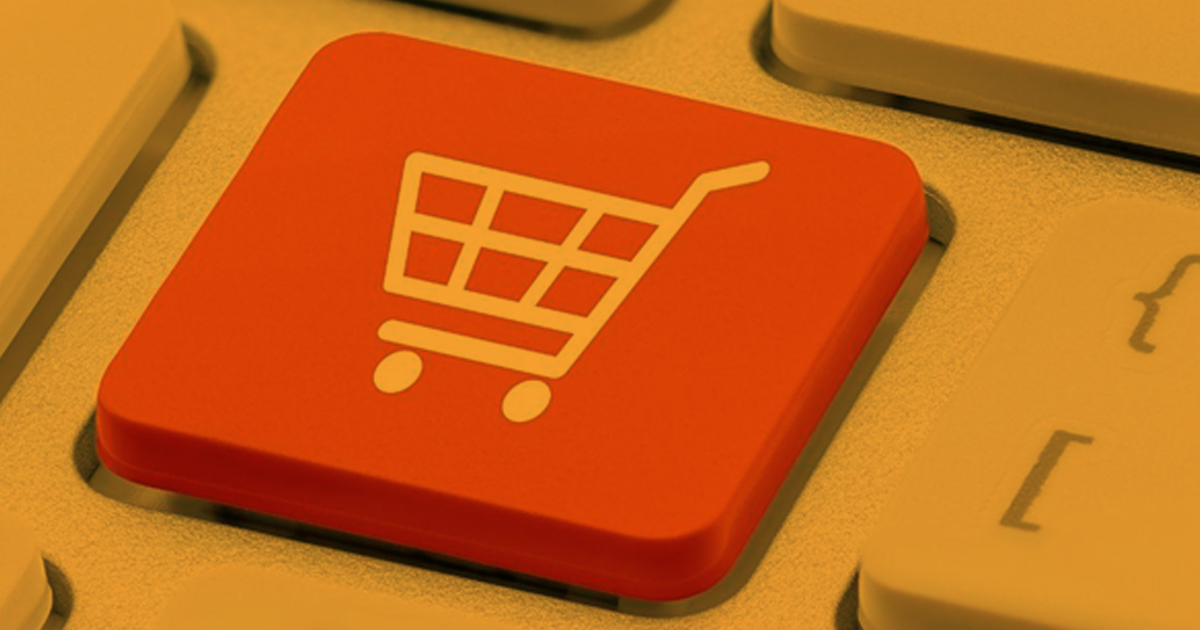 Image showing an online e-commerce shopping cart button on a keyboard.