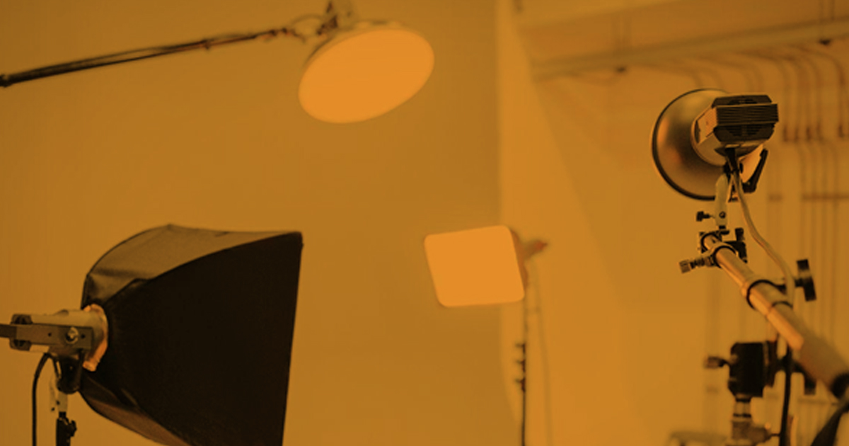 Image showing photoshoot setup with lightning equipment, Camera along with backdrops.